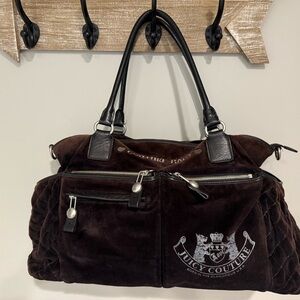 Juicy Couture diaper bag. Color black.
